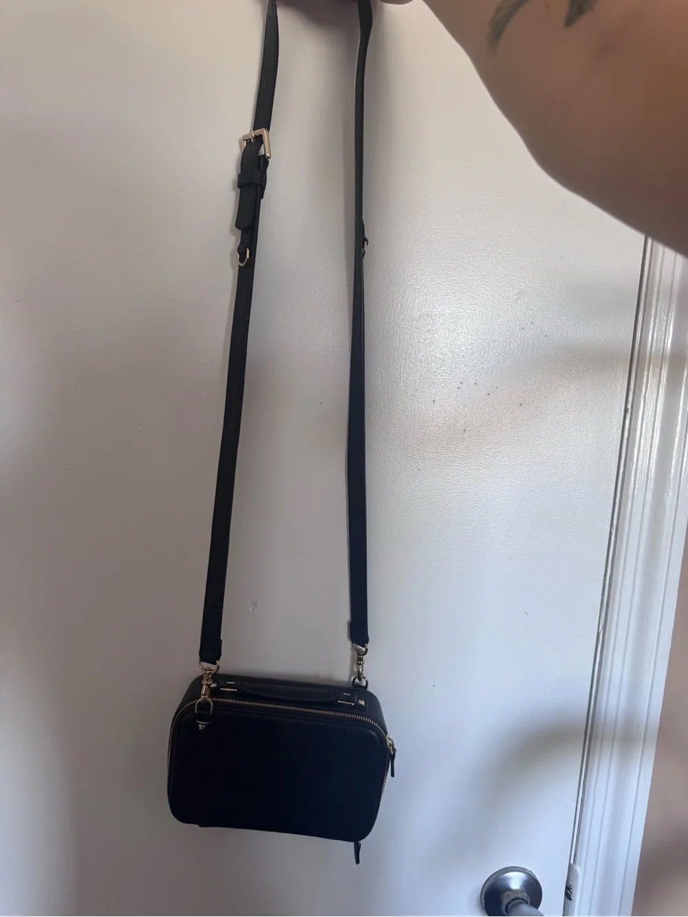 Classic Black Pebbled Crossbody Bag with Gold Accents